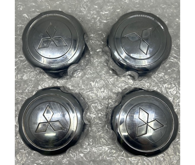 SET OF CENTRE WHEEL HUB CAP FOR A MITSUBISHI PAJERO/MONTERO - V23C