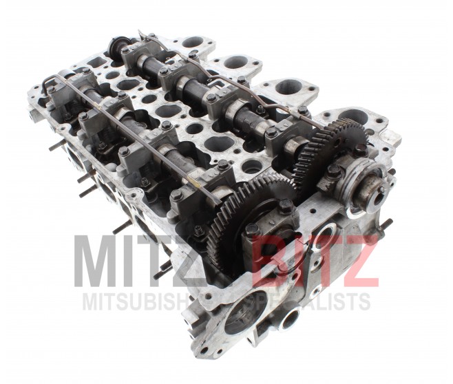 GENUINE BUILT UP CYLINDER HEAD ( PRESSURE TESTED AND SKIMMED ) FOR A MITSUBISHI L200,TRITON,STRADA - KL3T
