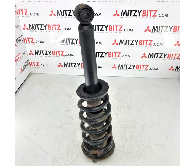 FRONT SHOCK ABSORBER AND COIL SPRING FOR A MITSUBISHI PAJERO/MONTERO - V97W