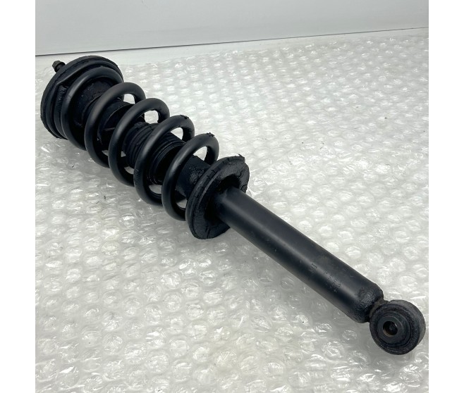 FRONT SHOCK ABSORBER AND COIL SPRING FOR A MITSUBISHI PAJERO/MONTERO - V88W