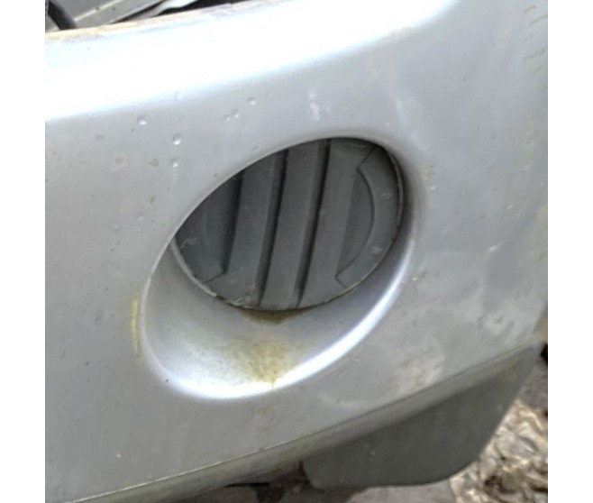 FRONT BUMPER LAMP HOLE COVER FOR A MITSUBISHI PAJERO - V93W