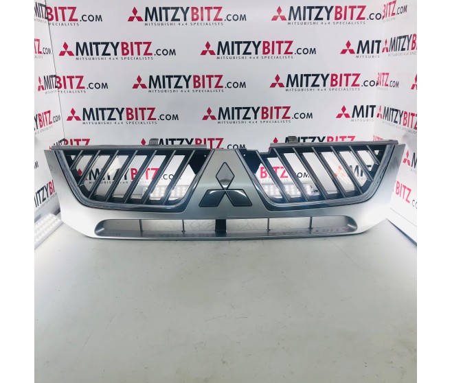 RADIATOR GRILLE FOR A MITSUBISHI L200 - K76T