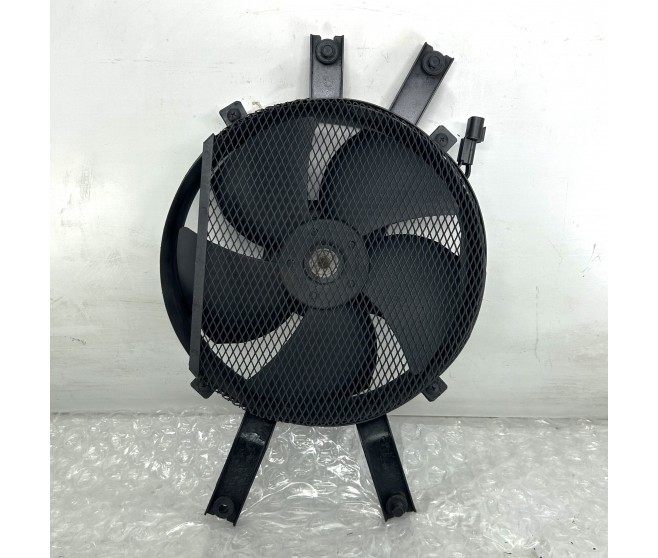 AIR CON CONDENSER FAN MOTOR AND SHROUD FOR A MITSUBISHI L200 - K76T