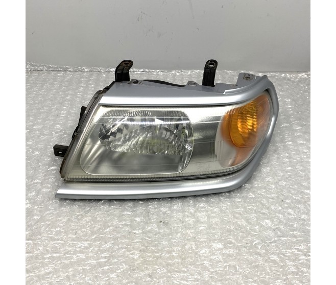 HEAD LAMP LIGHT FRONT LEFT FOR A MITSUBISHI PAJERO/MONTERO SPORT - K94W