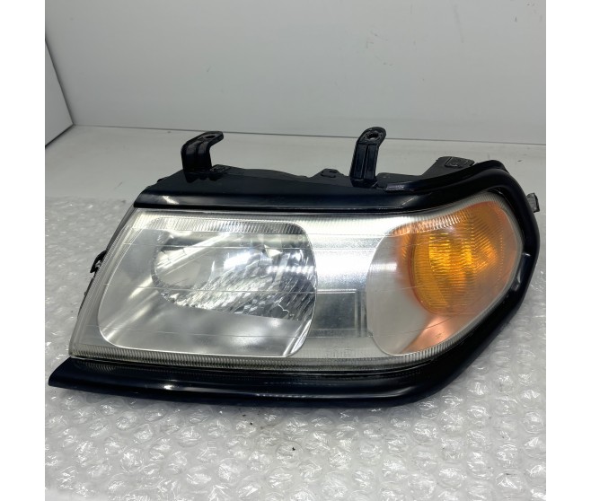 FRONT LEFT HEADLAMP FOR A MITSUBISHI PAJERO/MONTERO SPORT - K94W