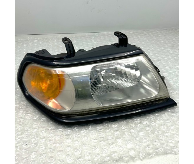 FRONT RIGHT HEADLAMP FOR A MITSUBISHI PAJERO/MONTERO SPORT - K94W