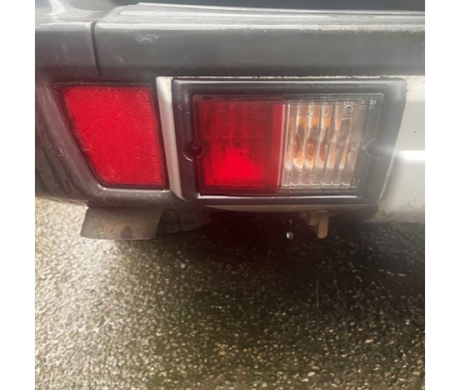 BUMPER TAIL LAMP REAR LEFFT FOR A MITSUBISHI V98W - 3200D-TURBO/LONG WAGON<07M-> - GLX(NSS4/EURO4),5FM/T RHD / 2006-09-01 -> - BUMPER TAIL LAMP REAR LEFFT