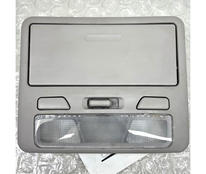 FRONT ROOM LAMP WITH SUNGLASSES HOLDER FOR A MITSUBISHI MONTERO SPORT - KH6W