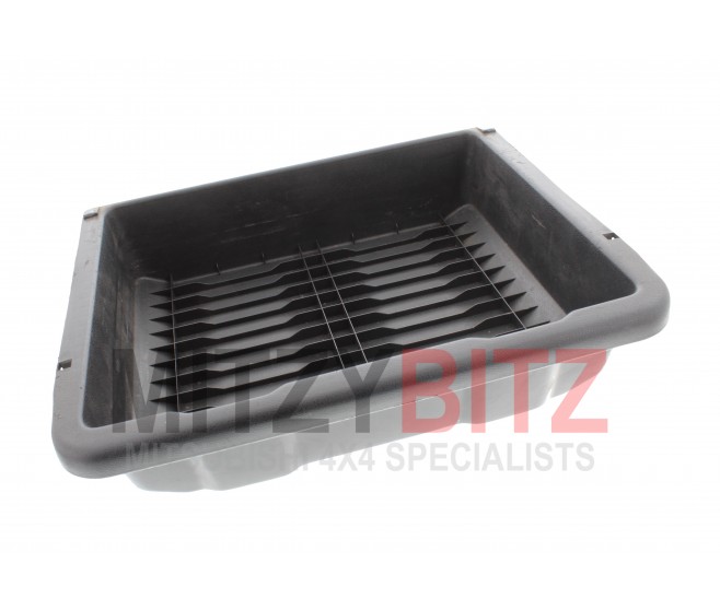 FRONT LEFT UNDER SEAT STORAGE TRAY FOR A MITSUBISHI PAJERO - V45W