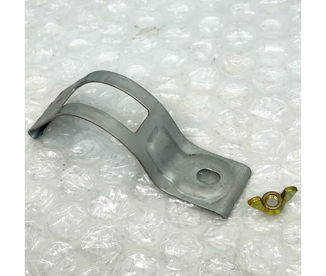 JACK HOLDING BRACKET AND WING NUT FOR A MITSUBISHI L200 - K34T