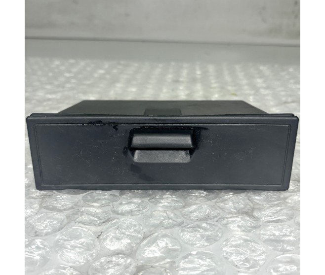 UNDER STEREO ACCESORY BOX  FOR A MITSUBISHI PAJERO/MONTERO - V23W