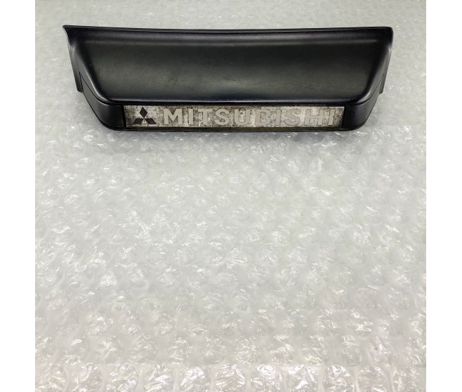 NUMBER PLATE TRIM REAR FOR A MITSUBISHI V20,40# - REAR EXTERIOR LAMP