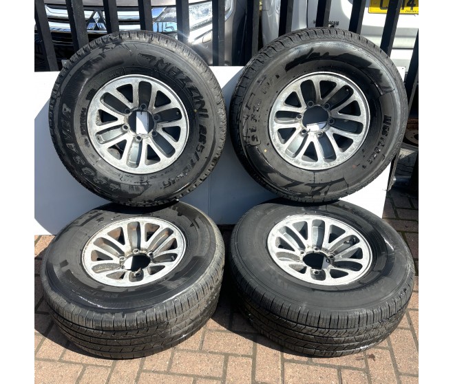 X4 WHEEL AND TYRES FOR A MITSUBISHI PAJERO/MONTERO - V43W