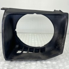 ROUND HEADLAMP BEZEL FRONT LEFT