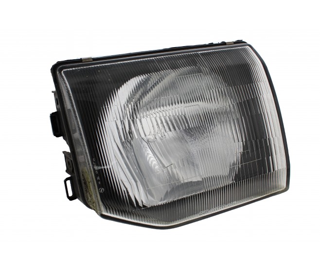 FRONT RIGHT HEADLIGHT FOR A MITSUBISHI V20-50# - FRONT RIGHT HEADLIGHT