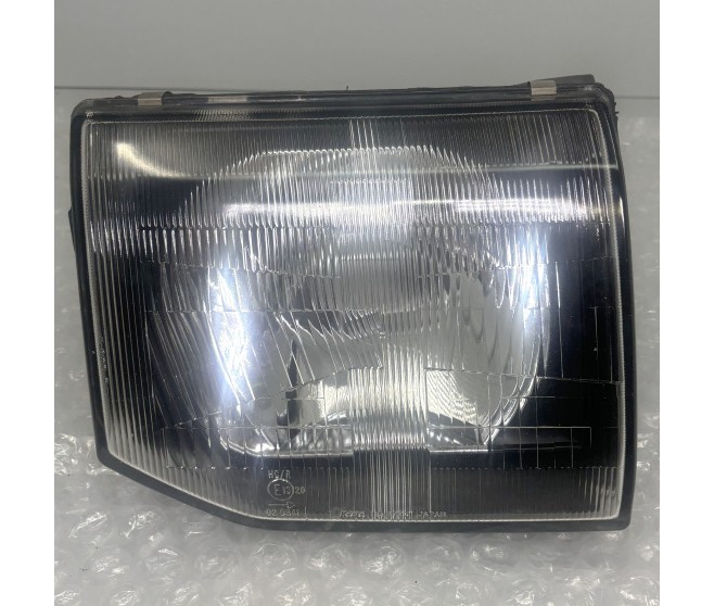 FRONT RIGHT HEADLAMP FOR A MITSUBISHI GENERAL (EXPORT) - CHASSIS ELECTRICAL