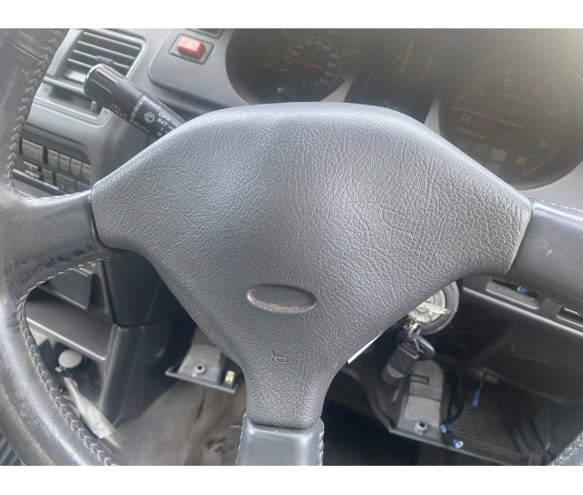 GREY STEERING WHEEL CENTRE PAD ONLY FOR A MITSUBISHI V10-40# - STEERING WHEEL
