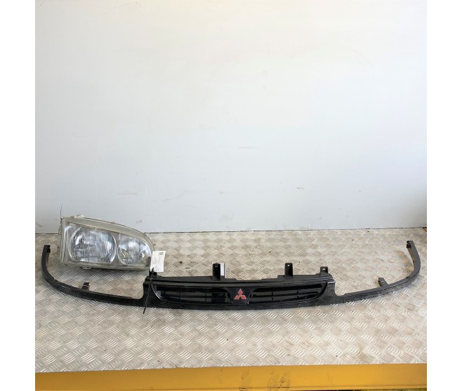 RADIATOR GRILLE AND HEADLAMP FOR A MITSUBISHI PA-PF# - RADIATOR GRILLE AND HEADLAMP