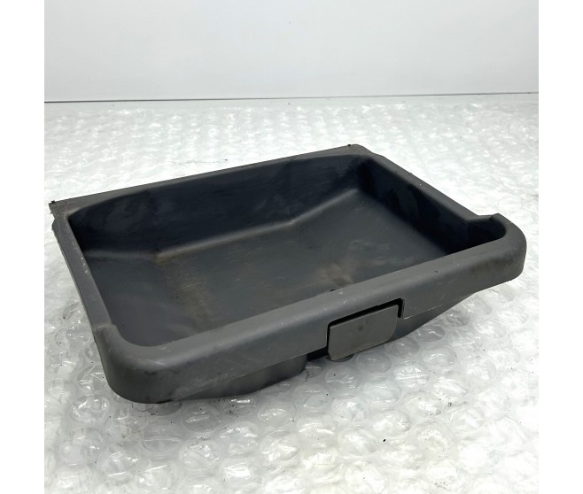 FRONT TRAY UNDER SEAT FOR A MITSUBISHI L200 - K74T