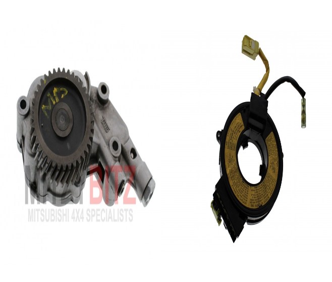 ENGINE OIL PUMP AND CLOCK SPRING SQUIB FOR A MITSUBISHI L200 - K77T