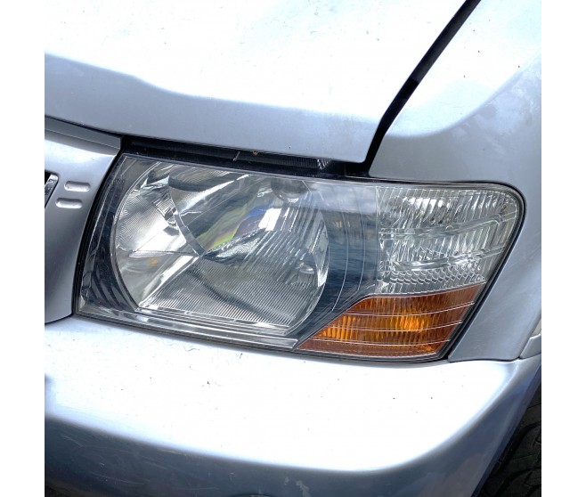 FRONT LEFT HEADLAMP FOR A MITSUBISHI V70# - HEADLAMP