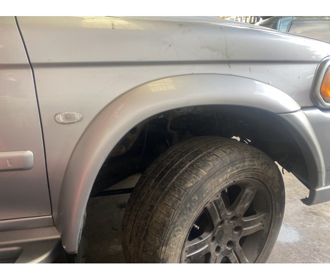 FRONT RIGHT WHEEL ARCH TRIM FLARE ONLY FOR A MITSUBISHI K90# - MUD GUARD,SHIELD & STONE GUARD