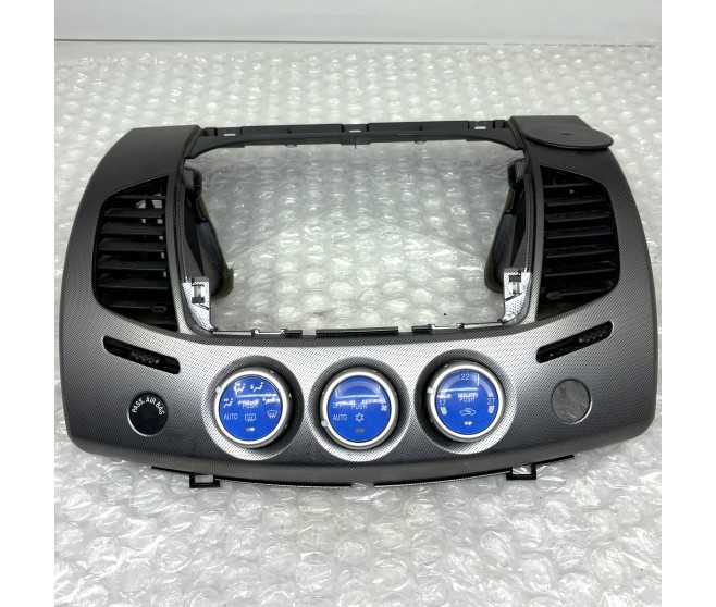 CENTRE DASH TRIM AND HEATER CONTROL FOR A MITSUBISHI L200,L200 SPORTERO - KB9T