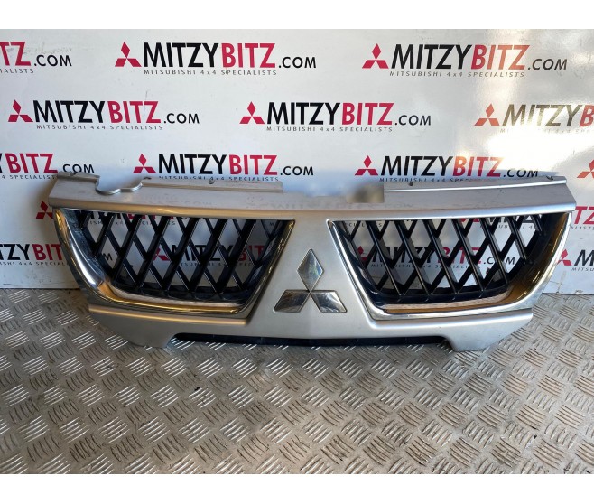 FRONT RADIATOR GRILLE FOR A MITSUBISHI NATIVA - K97W