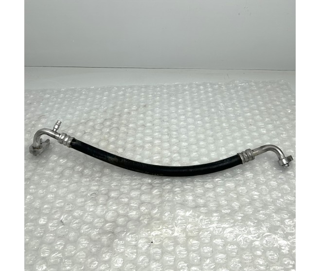 AIR CON COMPRESSOR SUCTION HOSE FOR A MITSUBISHI L200 - K64T