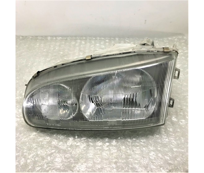 FRONT LEFT HEADLIGHT FOR A MITSUBISHI DELICA SPACE GEAR/CARGO - PD6W