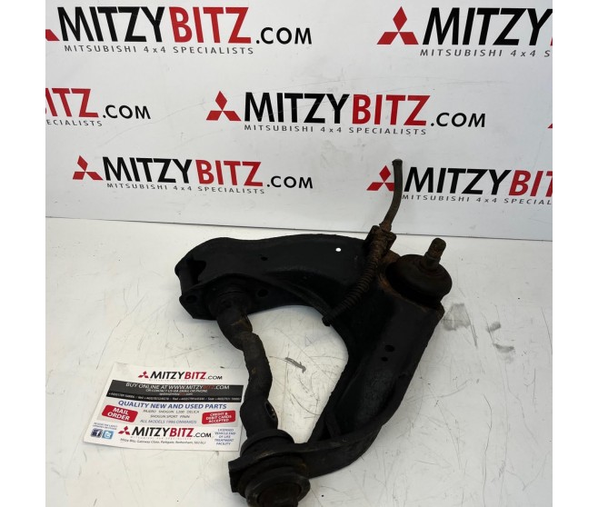 FRONT RIGHT UPPER CONTROL ARM FOR A MITSUBISHI L0/P0# - FRONT RIGHT UPPER CONTROL ARM