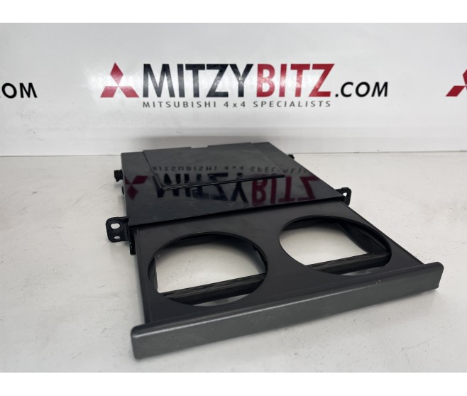 CUP HOLDER  FOR A MITSUBISHI L200 - K66T