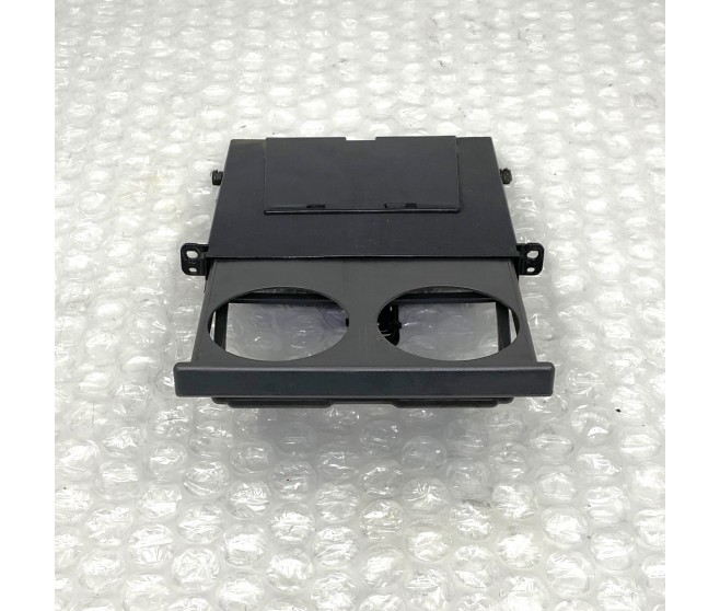 CUP HOLDER FOR A MITSUBISHI L200 - K64T