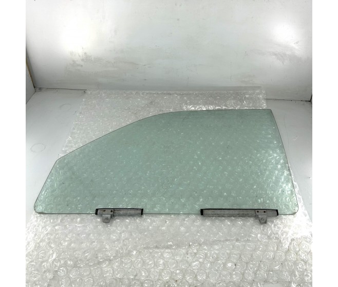 DOOR GLASS FRONT LEFT FOR A MITSUBISHI MONTERO SPORT - K86W