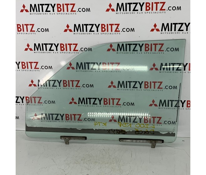 FRONT LEFT DOOR DROP GLASS FOR A MITSUBISHI L200 - K65T