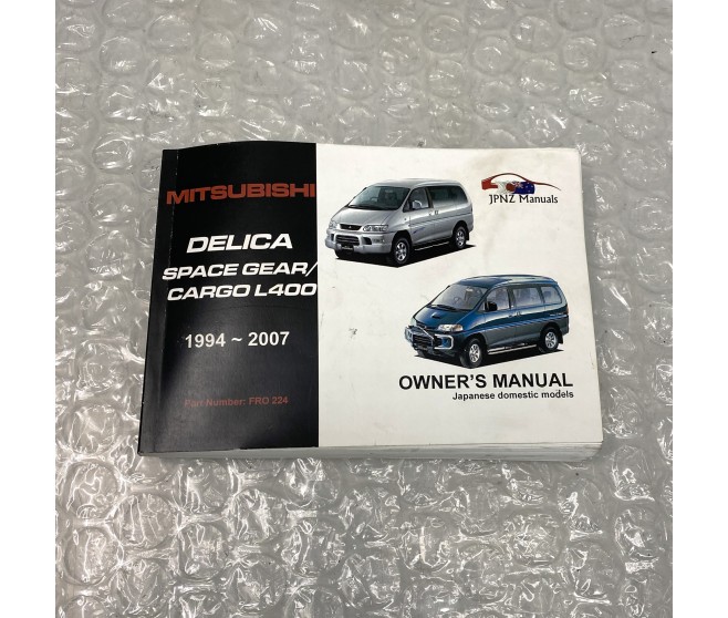 OWNER'S MANUAL FOR A MITSUBISHI DELICA SPACE GEAR/CARGO - PF6W