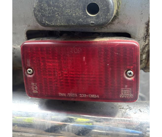 REAR FOG LAMP FOR A MITSUBISHI L200 - K64T