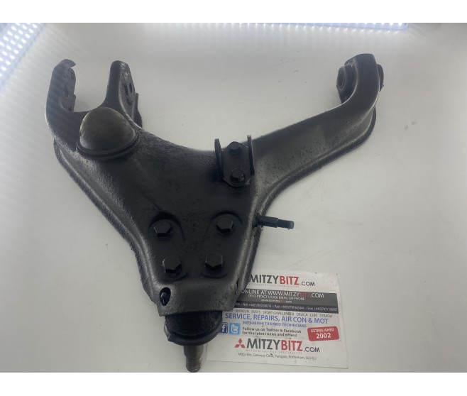 FRONT RIGHT LOWER WISHBONE CONTROL ARM FOR A MITSUBISHI L200 - K76T