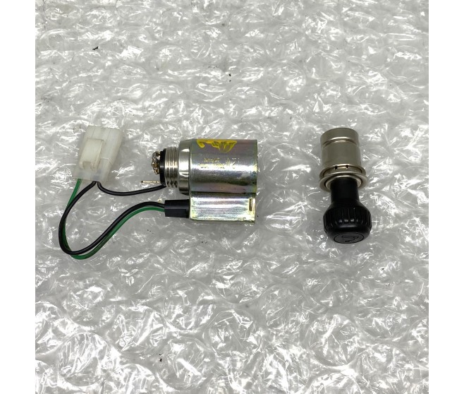 CIGAR LIGHTER AND HOUSING FOR A MITSUBISHI L200 - K77T