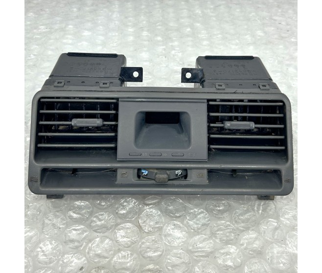 GREY CENTRE DASH VENTS AND CLOCK FOR A MITSUBISHI V10-40# - I/PANEL & RELATED PARTS