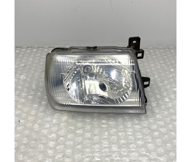 FRONT RIGHT HEADLIGHT FOR A MITSUBISHI PAJERO MINI - H58A