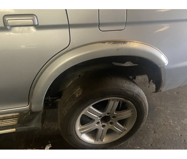 REAR LEFT WHEEL ARCH TRIM OVERFENDER ( WARRIOR ONLY ) FOR A MITSUBISHI CHALLENGER - K97WG