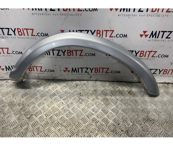 SILVER  REAR LEFT WHEEL ARCH TRIM OVERFENDER ( WARRIOR ONLY ) FOR A MITSUBISHI NATIVA - K86W