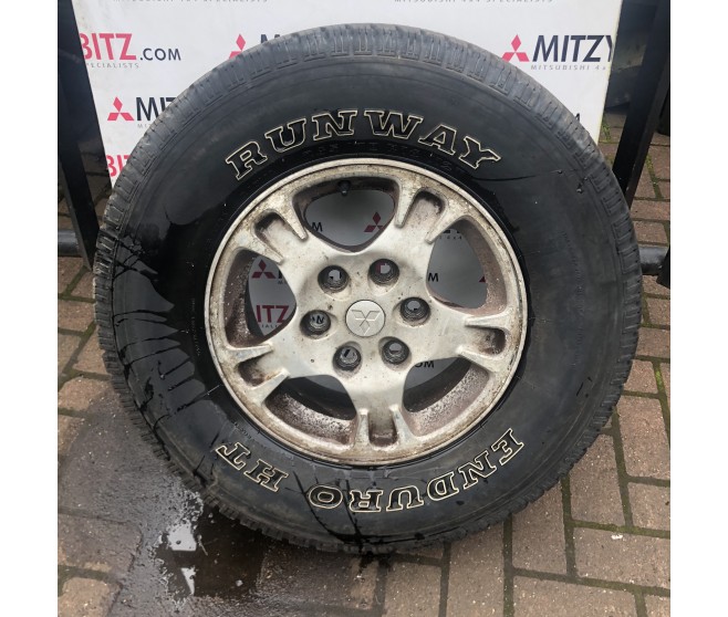 ALLOY WHEEL AND TYRE 16 FOR A MITSUBISHI PAJERO - V93W