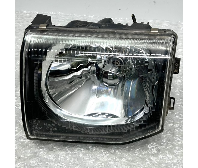 FRONT LEFT HEADLAMP CLEAR LENS FOR A MITSUBISHI PAJERO - V46WG