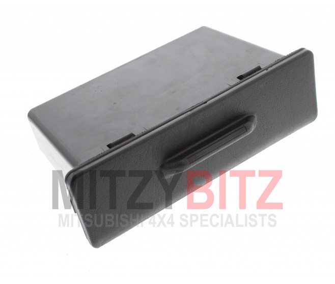 UNDER STEREO ACCESORY BOX WITH LID FOR A MITSUBISHI INTERIOR - 