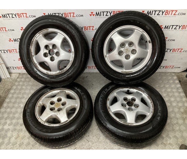 ALLOY WHEELS AND TYRES 16 X4 FOR A MITSUBISHI PAJERO IO - H77W