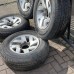 ALLOY WHEEL SET AND PART WORN TYRES - SEE DESC FOR A MITSUBISHI PAJERO/MONTERO SPORT - K96W