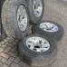 ALLOY WHEEL SET AND PART WORN TYRES - SEE DESC FOR A MITSUBISHI MONTERO SPORT - K99W