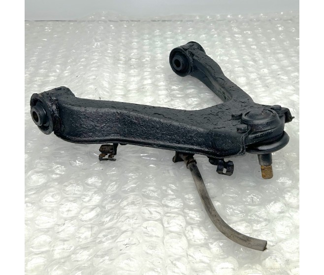 FRONT SUSPENSION ARM UPPER LEFT FOR A MITSUBISHI PAJERO/MONTERO - V93W